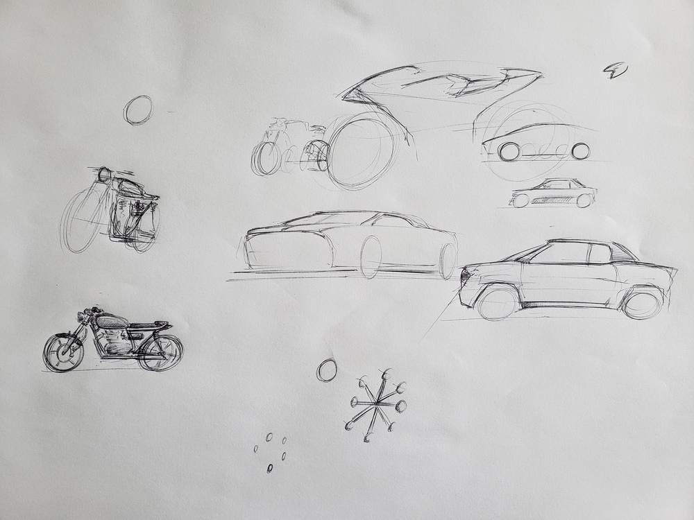 Doodle pen sketches. Couple unfinished bikes, cars, and random shapes